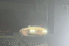 Deloris flying over the audience
